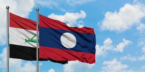 Iraq and Laos flag waving in the wind against white cloudy blue sky together. Diplomacy concept, international relations.
