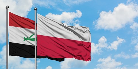 Iraq and Poland flag waving in the wind against white cloudy blue sky together. Diplomacy concept, international relations.