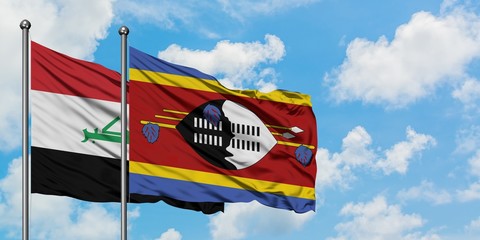 Iraq and Swaziland flag waving in the wind against white cloudy blue sky together. Diplomacy concept, international relations.