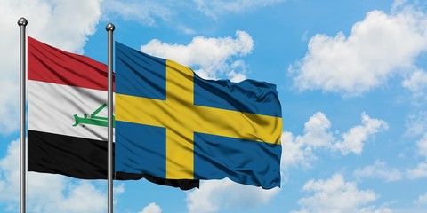 Iraq and Sweden flag waving in the wind against white cloudy blue sky together. Diplomacy concept, international relations.