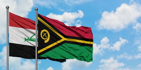 Iraq and Vanuatu flag waving in the wind against white cloudy blue sky together. Diplomacy concept, international relations.