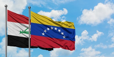 Iraq and Venezuela flag waving in the wind against white cloudy blue sky together. Diplomacy concept, international relations.