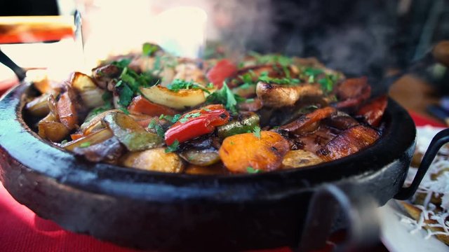 Bulgarian national dish - vegetable stew prepared and served in a ceramic pot