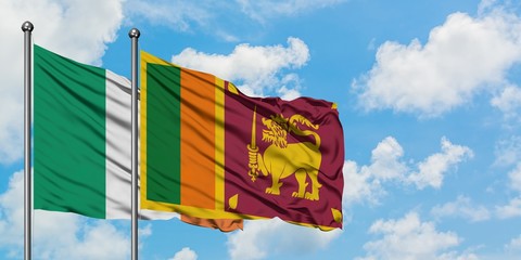 Ireland and Sri Lanka flag waving in the wind against white cloudy blue sky together. Diplomacy concept, international relations.