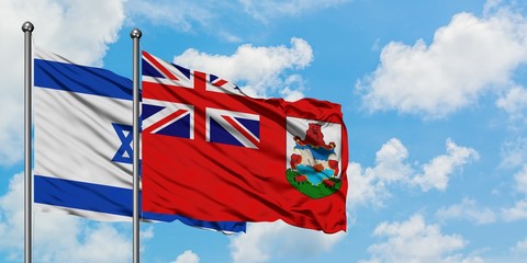 Israel and Bermuda flag waving in the wind against white cloudy blue sky together. Diplomacy concept, international relations.