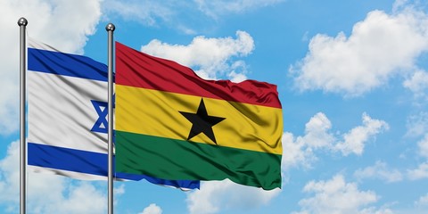 Israel and Ghana flag waving in the wind against white cloudy blue sky together. Diplomacy concept, international relations.