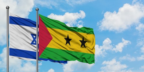 Israel and Sao Tome And Principe flag waving in the wind against white cloudy blue sky together. Diplomacy concept, international relations.
