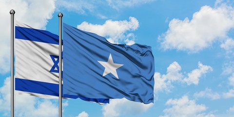 Israel and Somalia flag waving in the wind against white cloudy blue sky together. Diplomacy concept, international relations.