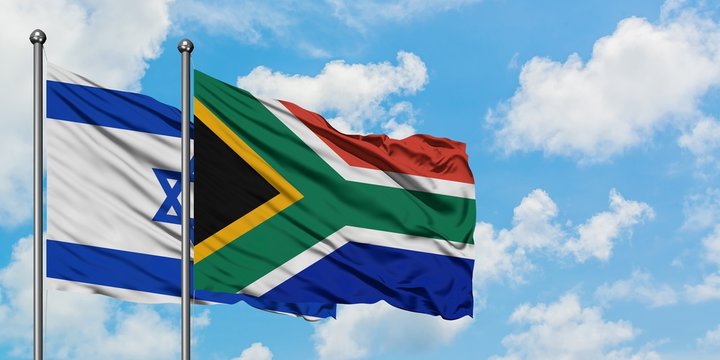 Israel and South Africa flag waving in the wind against white cloudy blue sky together. Diplomacy concept, international relations.