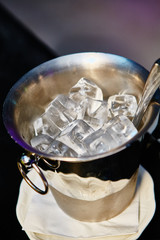Fototapeta na wymiar Close up ice in metal bucket