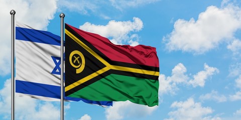 Israel and Vanuatu flag waving in the wind against white cloudy blue sky together. Diplomacy concept, international relations.