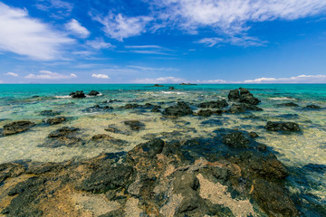 tranquillity and silence , abandoned beach with azure water, rocks on coast, beautiful turquoise...