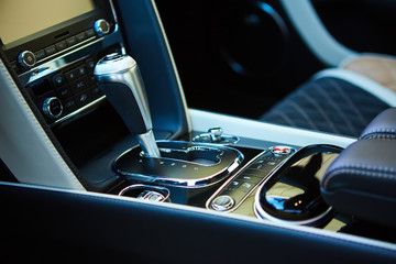 Fototapeta na wymiar Detail of modern car interior, gear stick.