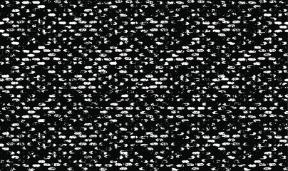 Small uneven spots and particles of debris. Abstract vector texture.  Distressed uneven background. Grunge texture overlay with fine grains isolated on white background. Vector illustration. EPS10.