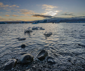 Icebergs in fantastic Jokulsarlon glacial lagoon on sunset. Southeast Iceland, Europe. Fantastic...