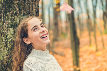 Fototapeta premium portrait of child in the autumn season outside