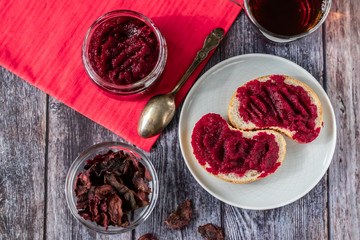 Sandwiches with natural, homemade beetroot jam, vanilla and sugar. On a red napkin. Healthy food, vegetarianism.