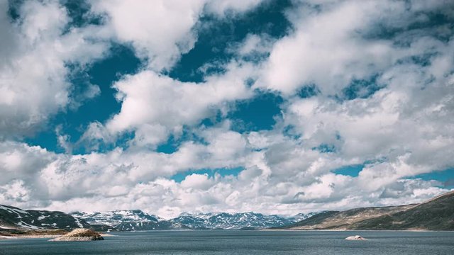 Oppland, Tyin Lake, Norway. Stones On Coast Of Beautiful Lake Tyin In Summer Day. Norwegian Nature. 4K