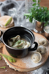 Russian Traditional Meat Dumplings Served in Broth, Pelmeni