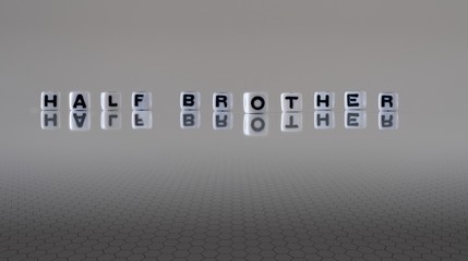 The concept of half brother represented by wooden letter tiles