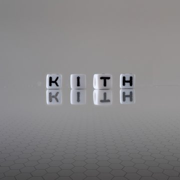 The concept of kith represented by wooden letter tiles