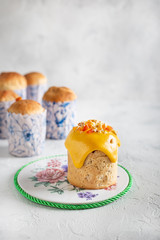 Homemade Easter cakes in paper wrapper. Light background