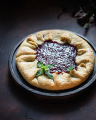Homemade open cake made of red currant shortcrust pastry, gallette