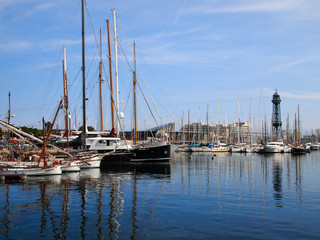 Yacht Parking in the port of Barcelona, in the background of the port management building.