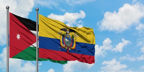 Jordan and Ecuador flag waving in the wind against white cloudy blue sky together. Diplomacy concept, international relations.