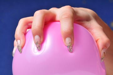 Closeup beautiful female hand with aqua fingernail