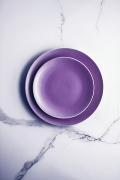 Purple empty plate on marble table background, tableware decor for breakfast, lunch and dinner for restaurant brand menu recipe, luxury holiday flatlay design