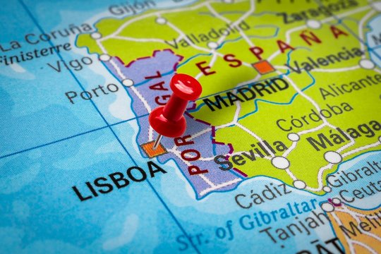 Pushpin pointing at Lisbon city in Portugal