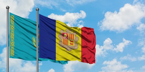 Kazakhstan and Andorra flag waving in the wind against white cloudy blue sky together. Diplomacy concept, international relations.