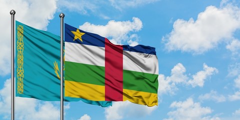 Kazakhstan and Central African Republic flag waving in the wind against white cloudy blue sky together. Diplomacy concept, international relations.