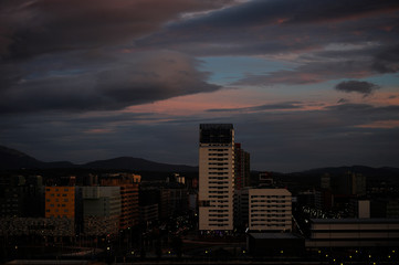 Fototapeta premium Storm clouds in the light of dawn on a dawn of early spring days. Vitoria-Gasteiz (Alava) Basque Country, Spain: salburua neighborhood