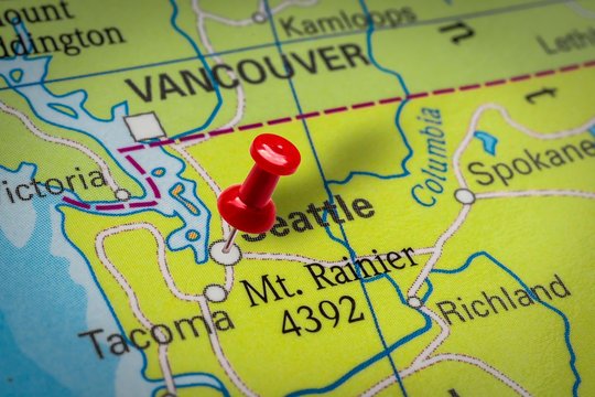 Pushpin pointing at Seatle city in USA