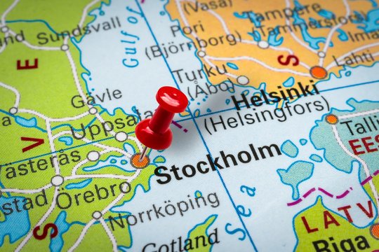 Pushpin pointing at Stockholm city in Sweden