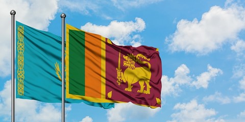 Kazakhstan and Sri Lanka flag waving in the wind against white cloudy blue sky together. Diplomacy concept, international relations.