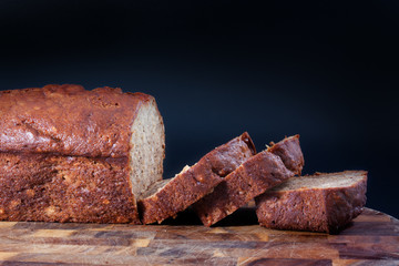 delicious banana cake on a wood plank