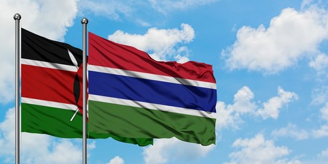 Kenya and Gambia flag waving in the wind against white cloudy blue sky together. Diplomacy concept, international relations.