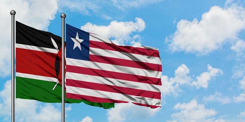 Kenya and Liberia flag waving in the wind against white cloudy blue sky together. Diplomacy concept, international relations.