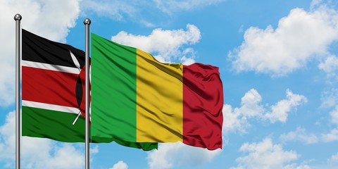 Kenya and Mali flag waving in the wind against white cloudy blue sky together. Diplomacy concept, international relations.