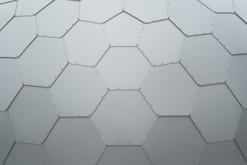 Cosmic texture, metal hexagonal sheets of metal connected in a single, honeycomb, spacecraft wall