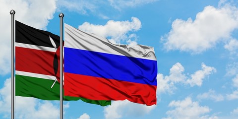 Kenya and Russia flag waving in the wind against white cloudy blue sky together. Diplomacy concept, international relations.