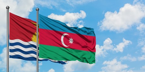 Kiribati and Azerbaijan flag waving in the wind against white cloudy blue sky together. Diplomacy concept, international relations.