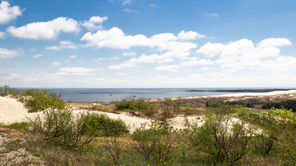Parnidis dune in Nida. The Curonian Spit. Sand and Grass. People Walking On the Sand Dunes Images....
