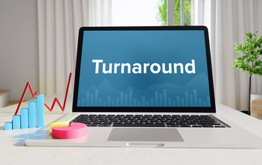 Turnaround – Statistics/Business. Laptop in the office with term on the display. Finance/Economics.