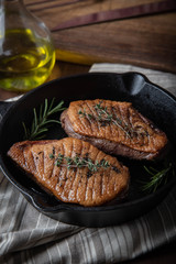 grilled duck breast meat with skillet