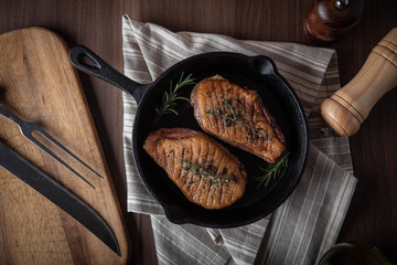 grilled duck breast meat with skillet