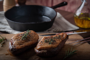 grilled duck breast meat with skillet